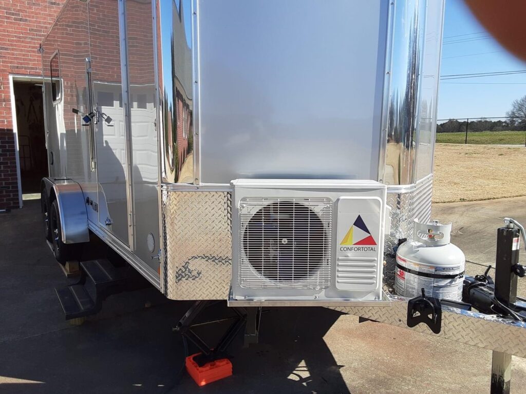 Mini split heat and AC unit attached to an enclosed trailer