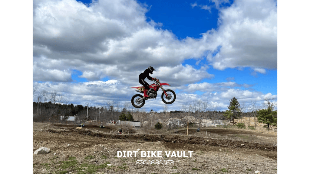 A CRF450R hitting a jump on a motocross track