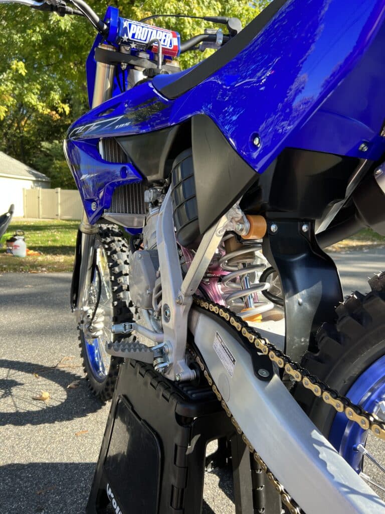Camera angle from low behind rear wheel of YZ125